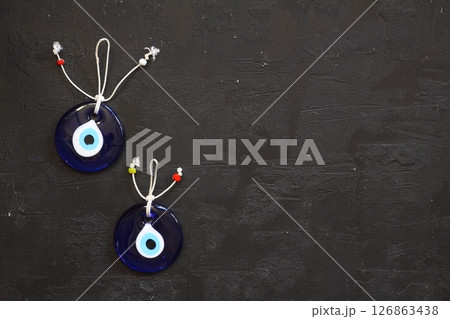 Turkish glass nazar on a white background Turkish glass nazar on a white background 126863438