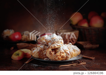Homemade mini apple strudels with apples and cinnamon. 126864196