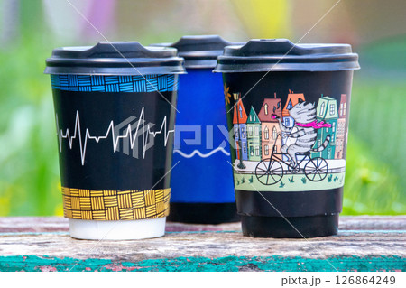 Simply flat lay design color paper coffee cup on pastel colorful trendy background. Takeaway drink container. Good morning wake up awake concept. Template of drink mockup. Top view copy space 126864249