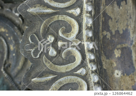 old-fashioned nail on the icon. restoration of metal old-fashioned nail on the icon. restoration of metal 126864462