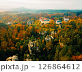 Exploring Gruba Skala Castle amid vibrant autumn foliage in the Czech Republic 126864612