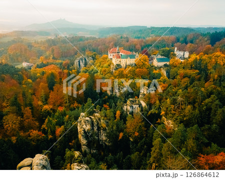 Exploring Gruba Skala Castle amid vibrant autumn foliage in the Czech Republic Exploring Gruba Skala Castle amid vibrant autumn foliage in the Czech Republic 126864612
