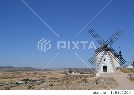 Scenic view of historic spanish windmills against a vast countryside. Consuegra. La Mancha. Spain 126865209