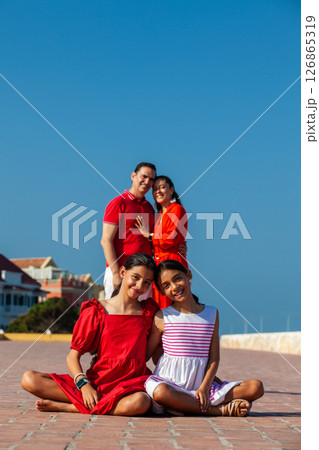 Young family of four traveling together. Family love concept. Travel concept. Cartagena de Indias. 126865319