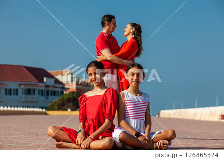 Young family of four traveling together. Family love concept. Travel concept. Cartagena de Indias. 126865324