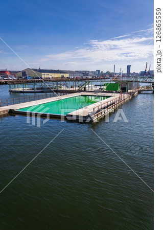 Floating swimming pools with sauna at Allmanna harbour bath in Frihamnen, Gothenburg, Sweden, sunny day 126865559