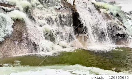 Forest river and waterfall in winter 126865686