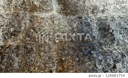 A Textured Surface Showcasing Variations of Dark and Light Shades and Tones in Detail 126865754