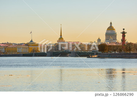 ice drift on the Neva River with a view of the arrow of Vasilyevsky Island with rostral columns, the Winter Palace, St. Isaac's Cathedral, the Savior on Spilled Blood 126866290