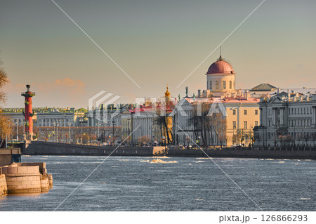 ice drift on the Neva River with a view of the arrow of Vasilyevsky Island with rostral columns, the Winter Palace, St. Isaac's Cathedral, the Savior on Spilled Blood ice drift on the Neva River with a view of the arrow of Vasilyevsky Island with rostral columns, the Winter Palace, St. Isaac's Cathedral, the Savior on Spilled Blood 126866293