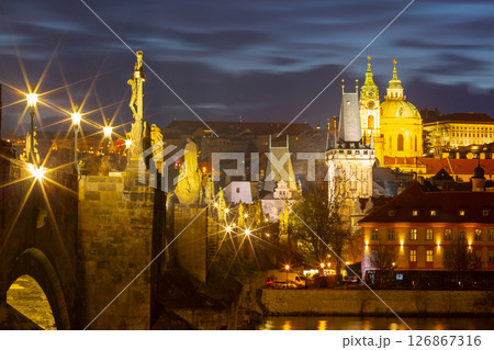 Illuminated Charles Bridge in Prague Czech Republic at dusk Illuminated Charles Bridge in Prague Czech Republic at dusk 126867316