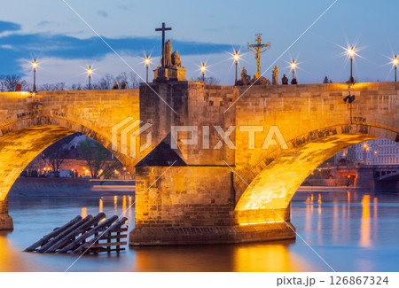 Illuminated Charles Bridge in Prague Czech Republic at dusk Illuminated Charles Bridge in Prague Czech Republic at dusk 126867324