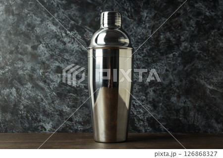 Metallic shiny shaker on a dark background 126868327