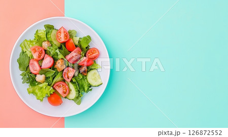 Fresh and Vibrant Salad on Colorful Background - Healthy Dinner Concept with Fresh Vegetables 126872552