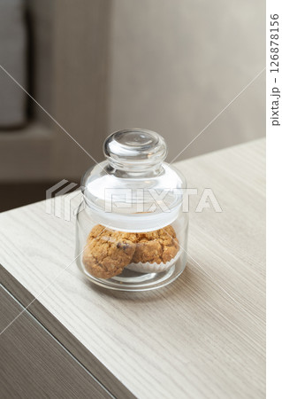 Cookies in a jar hint at a sweet break in a quiet corner. Cookies in a jar hint at a sweet break in a quiet corner. 126878156