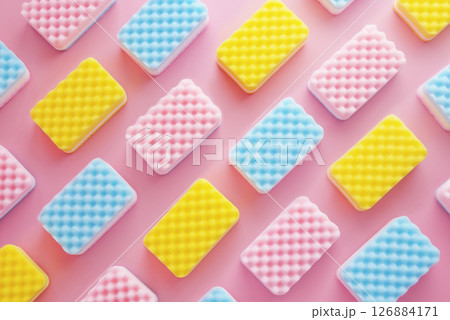 colorful cleaning dish sponges pattern isolated on pink background . background of different sponges in pastel color 126884171