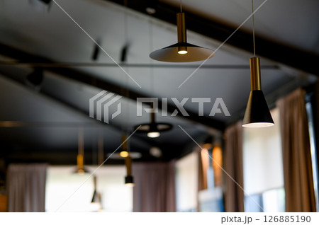 Pendant lights in the restaurant interior Pendant lights in the restaurant interior 126885190