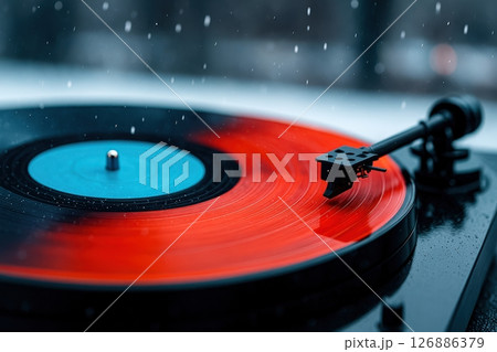 Red and blue record with a stylus on it 126886379
