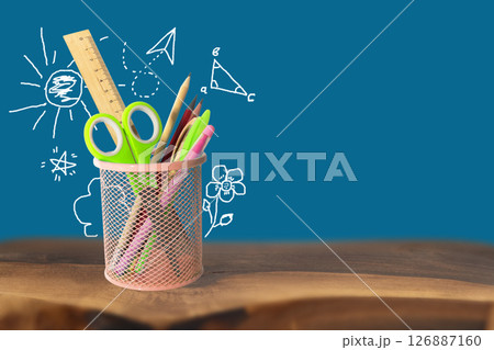 School and office supplies, pens, pencils, ruler, compass in a metal cup on a white background. Back to school School and office supplies, pens, pencils, ruler, compass in a metal cup on a white background. Back to school 126887160