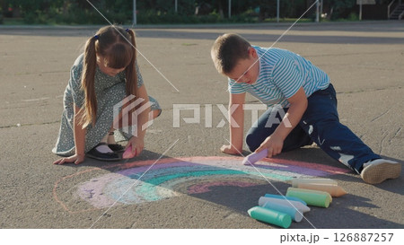 Kid child baby boy girl Rainbow drawing with chalk, kids sitting on road, children collaboration, expression through color, joyful sketching, art adventure, kids outdoor ideas, pastel colors on cement 126887257