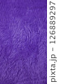 Purple faux fur background creating soft texture 126889297