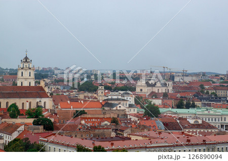 Cityscape of Vilnius, Lithuania from viewpoint in a summer cloudy day. View of the old town with orange roofs. Famous tourist destination. Travel photography. 126890094