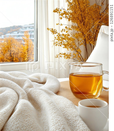 Cozy autumn morning with tea and soft blanket 126891151