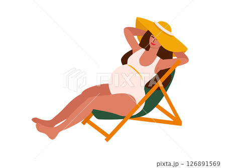 pregnant woman in swimsuit in sun lounger - isolated pregnant woman in swimsuit in sun lounger - isolated 126891569
