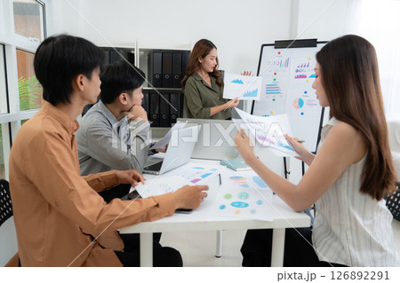 Group asian business team meeting in office about report marketing and finance with presenting. Group asian business team meeting in office about report marketing and finance with presenting. 126892291