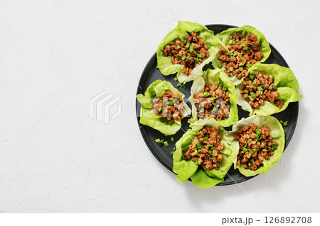 Fresh and Crispy Ground Chicken lettuce wraps 126892708