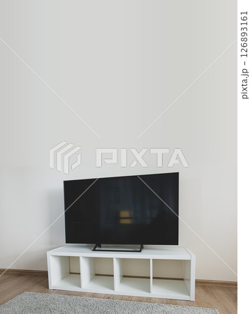 Lcd tv on white shef at modern room interior 126893161