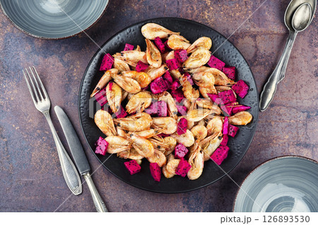 Prawns shrimps roasted with dragon fruit. 126893530