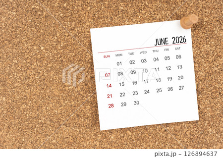 White calendar sheet for June 2026 with thumbtack on board, Position with copy space. White calendar sheet for June 2026 with thumbtack on board, Position with copy space. 126894637