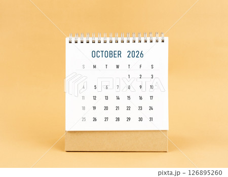 October 2026 desk calendar on yellow background, Front view. October 2026 desk calendar on yellow background, Front view. 126895260