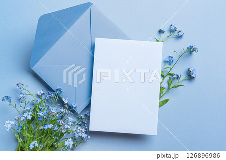 Greeting card and envelope design with blue forget-me-not flowers 126896986
