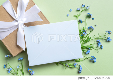 Greeting card and blue forget-me-not flowers 126896990