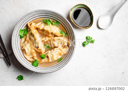 Wonton soup. Asian dumpling soup. 126897002