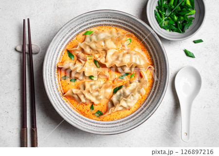 Thai Coconut Curry Dumpling Soup 126897216