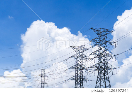Three tall power lines are in the sky 126897244