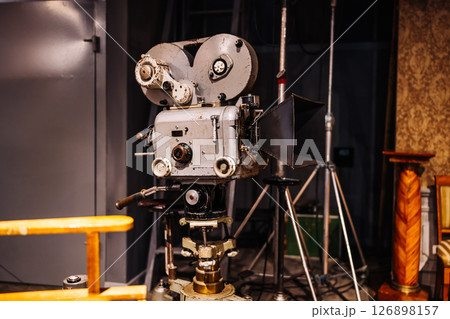 Vintage movie camera is recording in a studio Vintage movie camera is recording in a studio 126898157