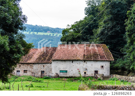 Charming stone farmhouse with tile roof nestled in the Saja River Valley, Cantabria. 126898263