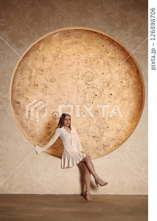 A Dreamy Model Gracefully Posing Against a Stunningly Large and Enchanting Moon Wall Art A Dreamy Model Gracefully Posing Against a Stunningly Large and Enchanting Moon Wall Art 126898706