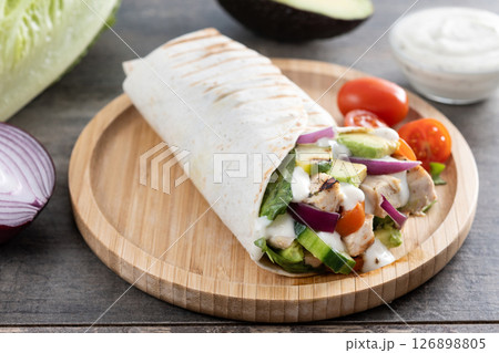 A delicious grilled chicken wrap 126898805