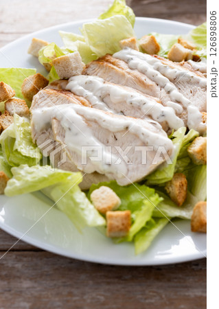 Crunchy Caesar salad with chicken Crunchy Caesar salad with chicken 126898806