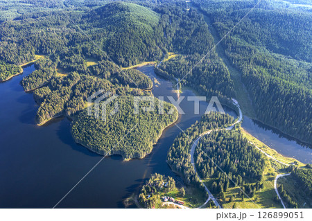 Beautiful blue water and green forest. 126899051