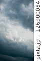 Gray contrasting fluffy storm clouds 126900084