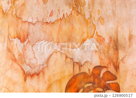 abstract pattern on silk fabric texture in yellow and brown tones abstract pattern on silk fabric texture in yellow and brown tones 126900517