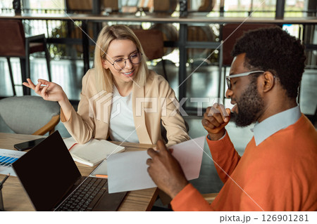 Group of business consultants looking involved while discussing a new case 126901281