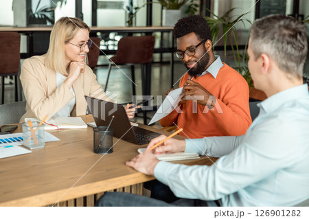 Business consultants having a meeting and discussing new project 126901282