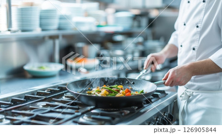 Chef cooking in a professional kitchen setting.のイラスト素材 [126905844] - PIXTA